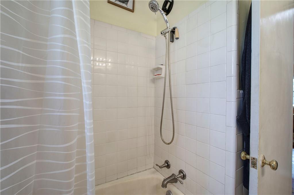 29 Johns Drive Northeast Rome, GA 30165 - Photo 23 of 32 a bathroom with a shower
