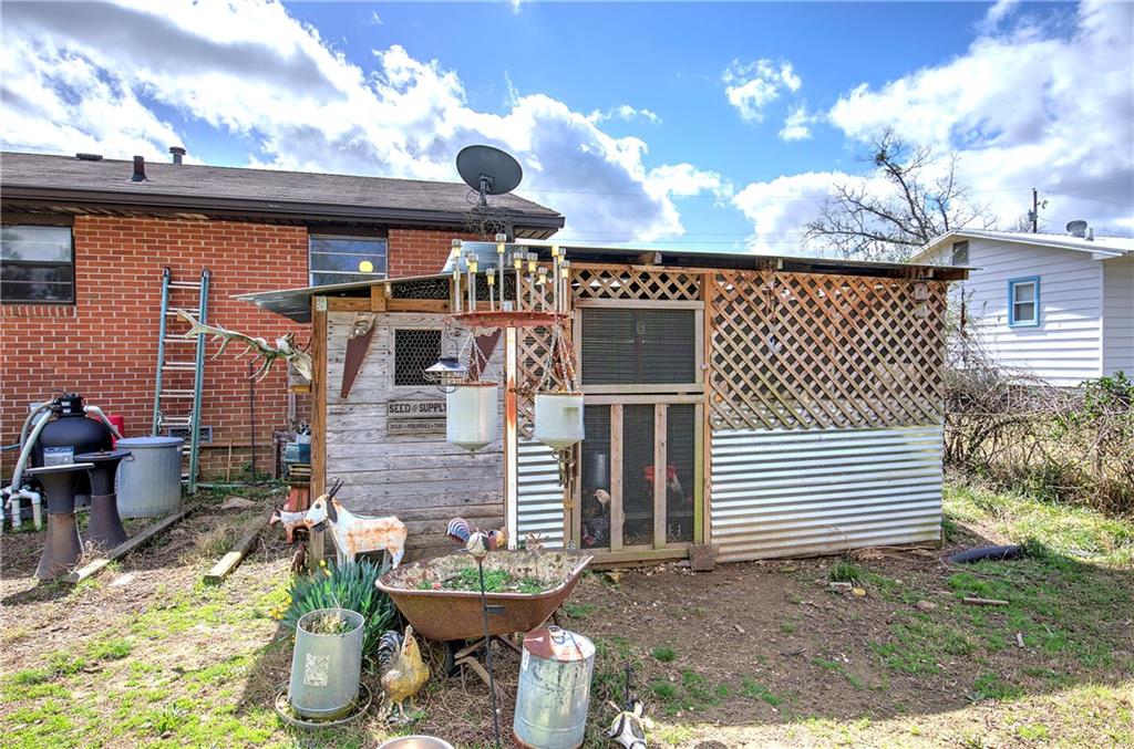 29 Johns Drive Northeast Rome, GA 30165 - Photo 23 of 26 a front view of a house with a yard