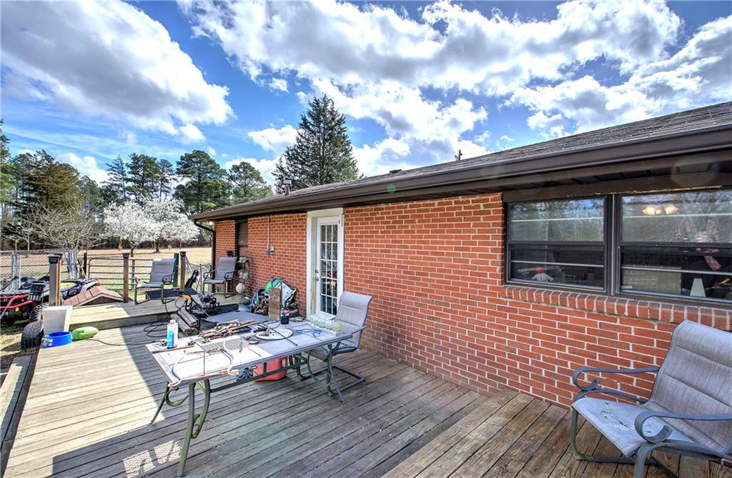 29 Johns Drive Northeast Rome, GA 30165 - Photo 24 of 26 a backyard of a house with seating space