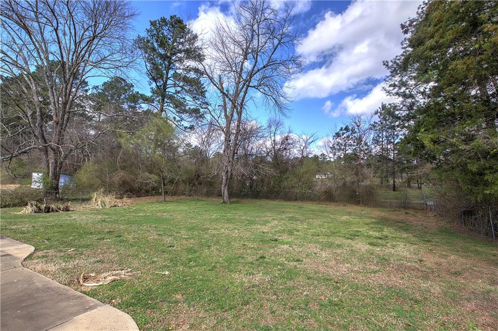 29 Johns Drive Northeast Rome, GA 30165 - Photo 24 of 32 a backyard of a house with lots of green space
