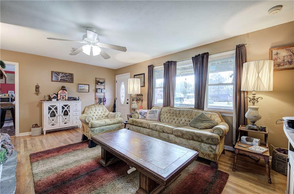 29 Johns Drive Northeast Rome, GA 30165 - Photo 3 of 26 a living room with furniture and a large window