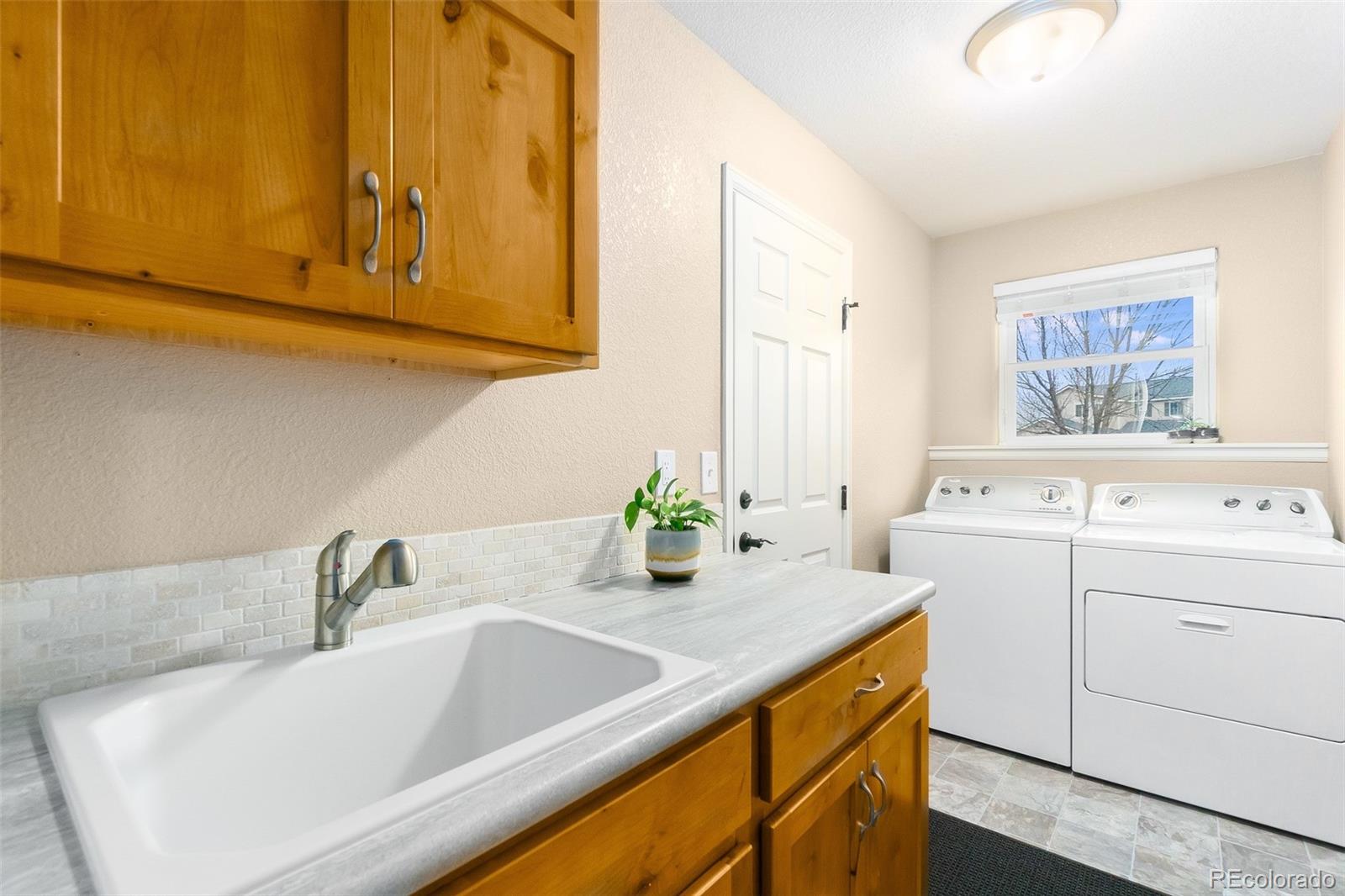 2151 Redhead Drive Johnstown, CO 80534 - Photo 15 of 37 a bathroom with a sink and a bathtub