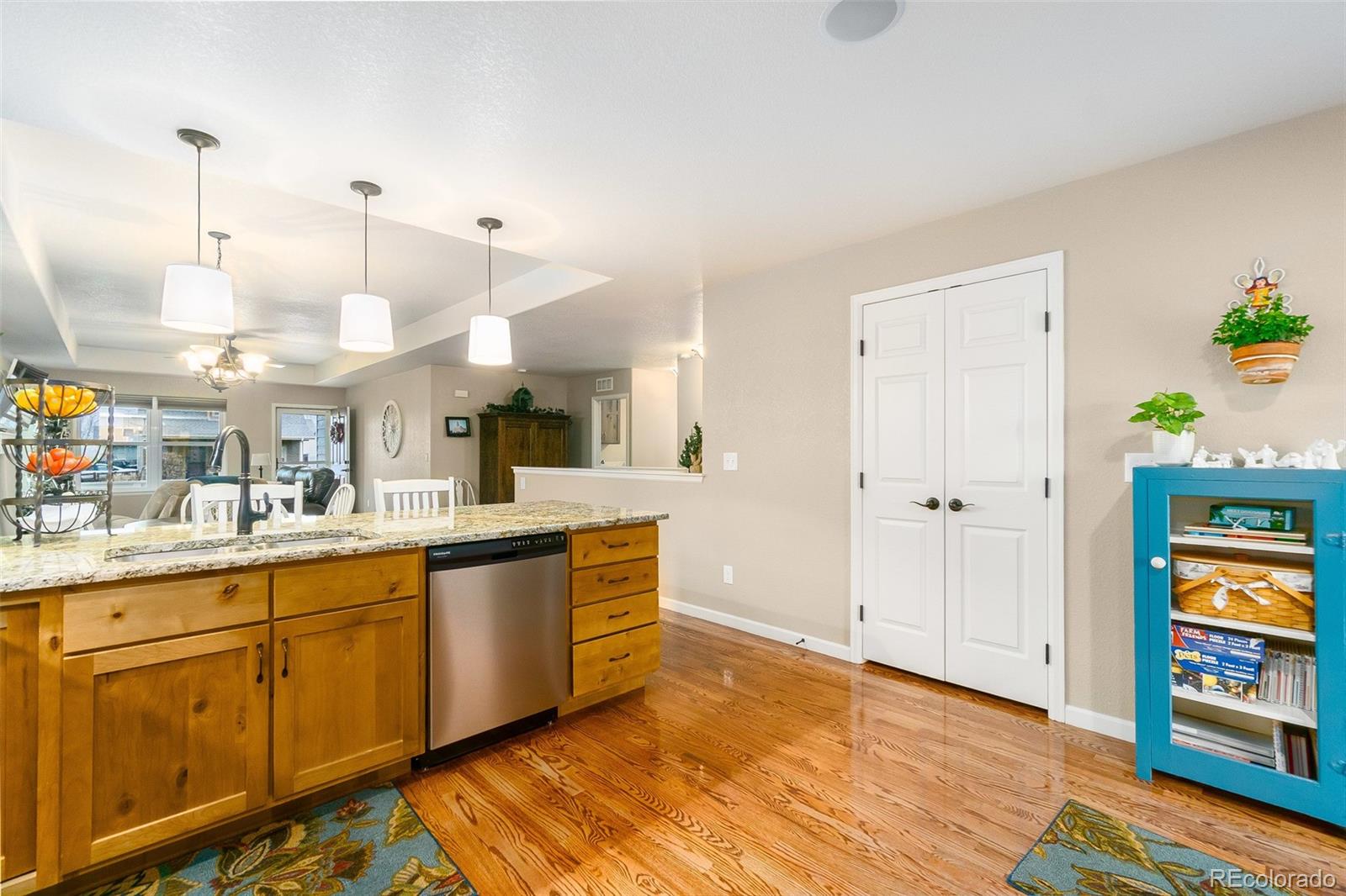 2151 Redhead Drive Johnstown, CO 80534 - Photo 19 of 37 a view of a kitchen and wooden floor