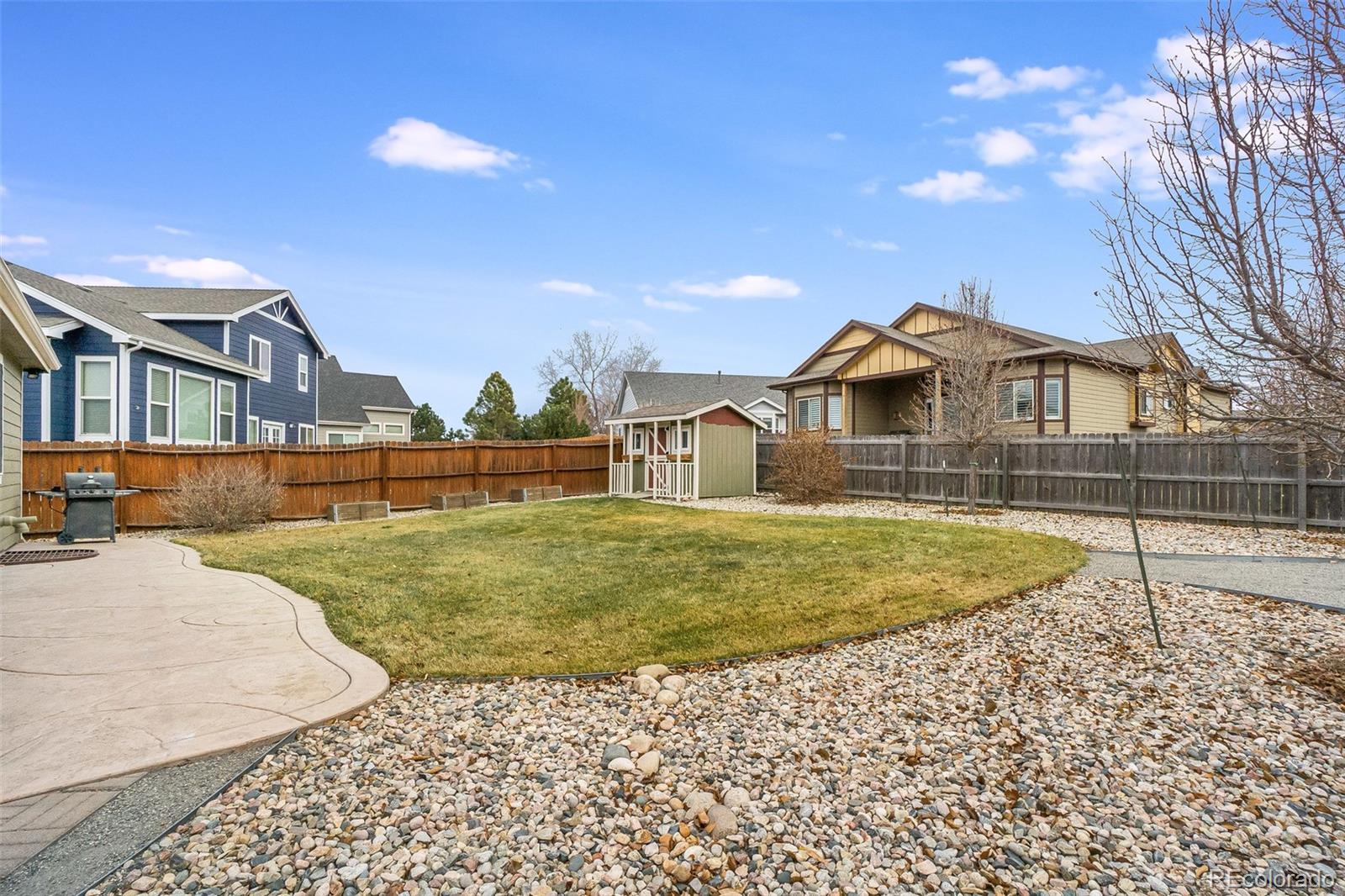 2151 Redhead Drive Johnstown, CO 80534 - Photo 36 of 37 a view of a house with a yard