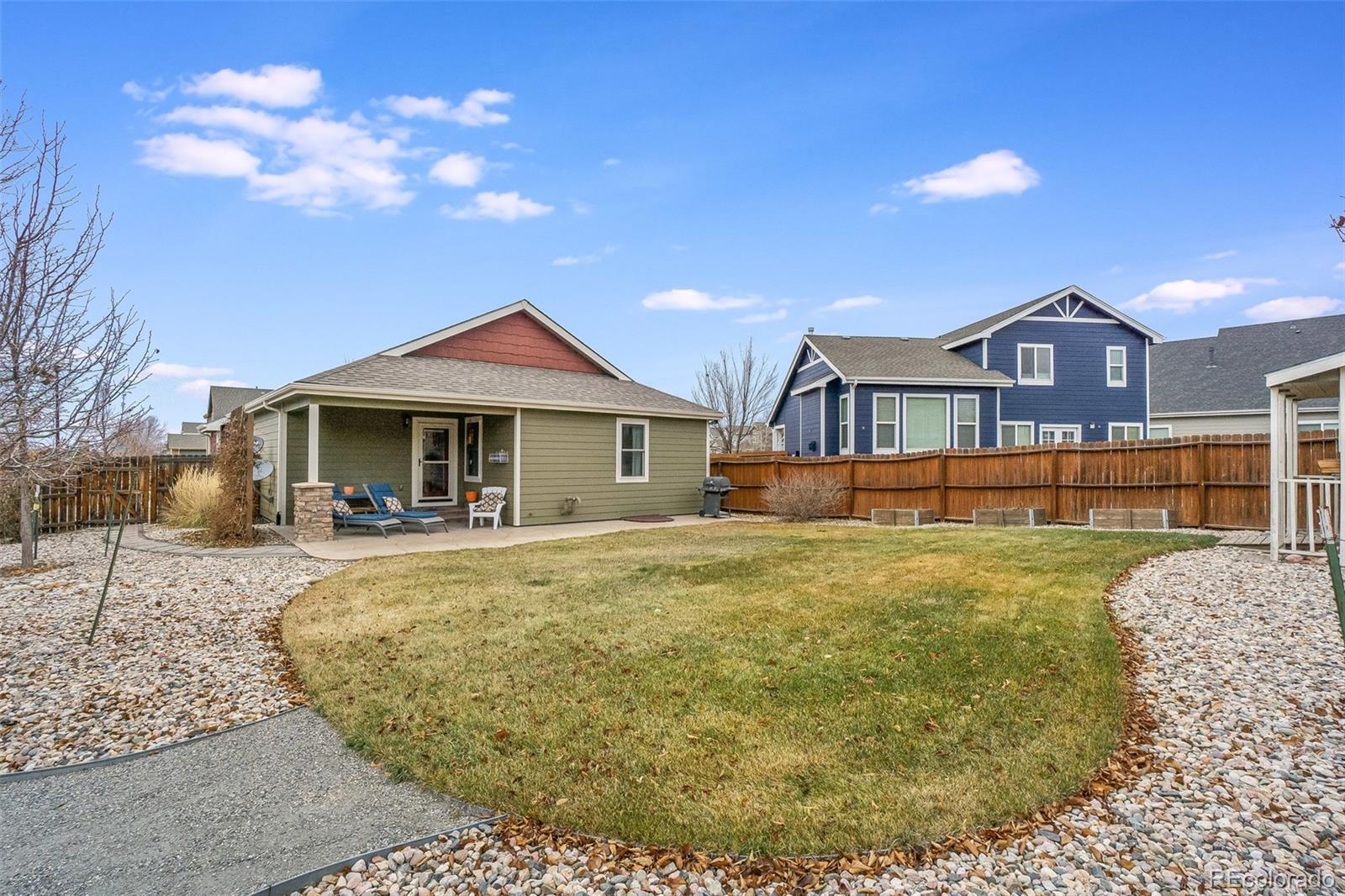 2151 Redhead Drive Johnstown, CO 80534 - Photo 37 of 37 a front view of a house with garden