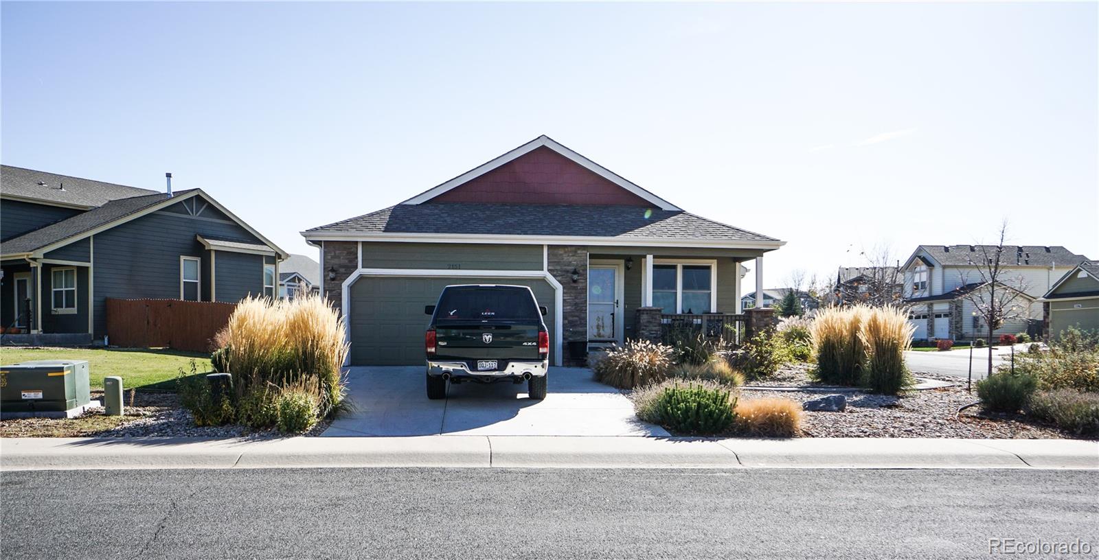 2151 Redhead Drive Johnstown, CO 80534 - Photo 5 of 37 a front view of a house with patio