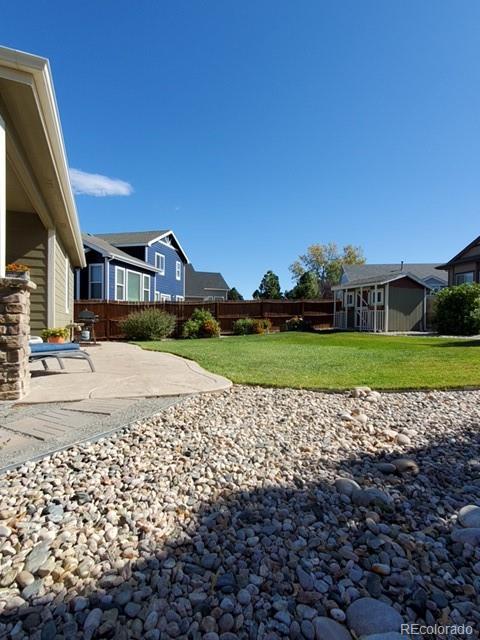 2151 Redhead Drive Johnstown, CO 80534 - Photo 8 of 37 a view of a house with a big yard