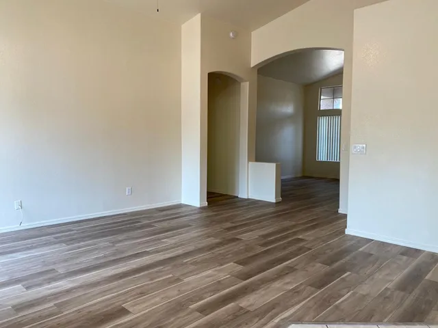 a kitchen with stainless steel appliances granite countertop a refrigerator sink and cabinets