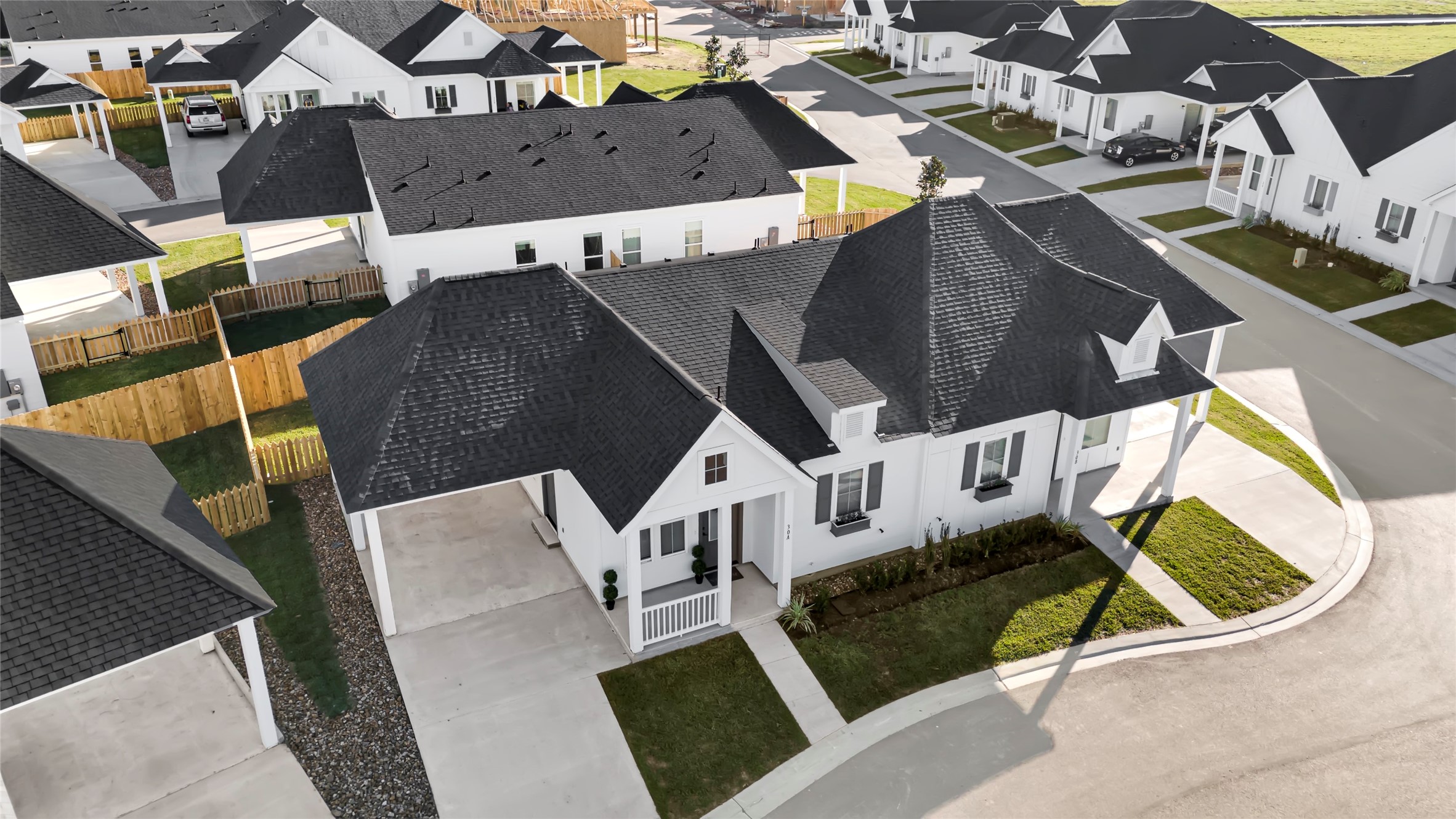 38634 Spur 149 Road, Unit 39B Magnolia, TX 77354 - Photo 4 of 50 GORGOUES ARIAL VIEW OF TWO AND THREE BEDROOM COTTAGES! ALL EQUIPPED WITH PRIVATE COVERED PULL-UP DRIVEWAY & SPACIOUS BACKYARDS!