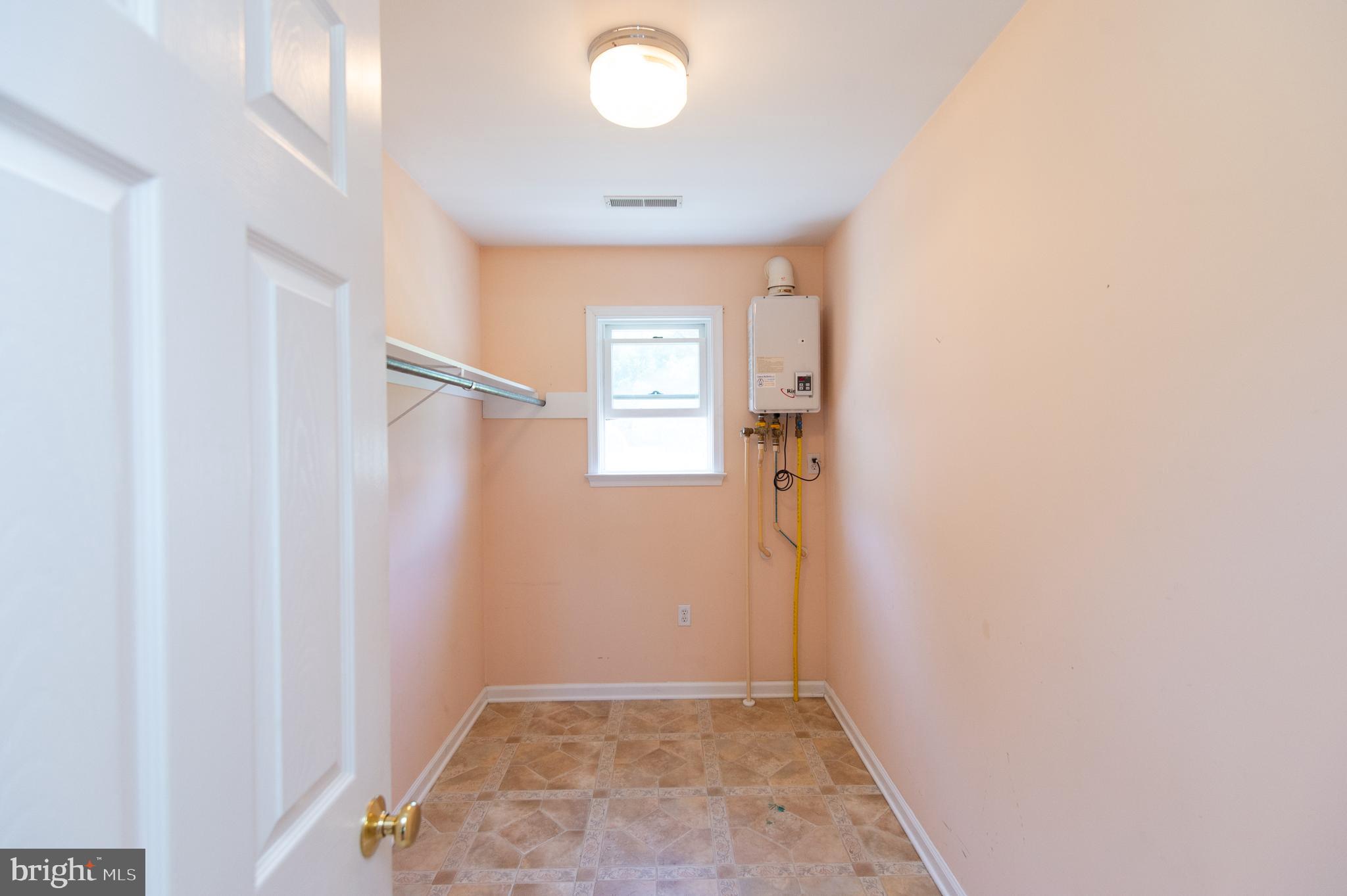 9818 Tilghman Island Road McDaniel, MD 21647 - Photo 18 of 38 walk-in closet
