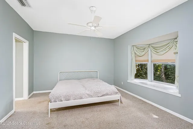 a view of lake with green space