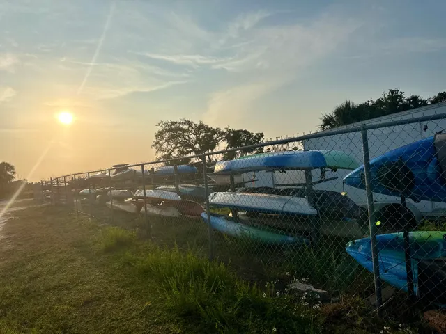 a kitchen with stainless steel appliances a refrigerator sink and cabinets
