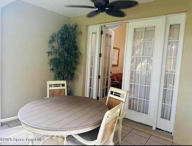 a view of a living room with a fireplace