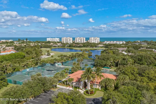 a view of a patio with wooden floor