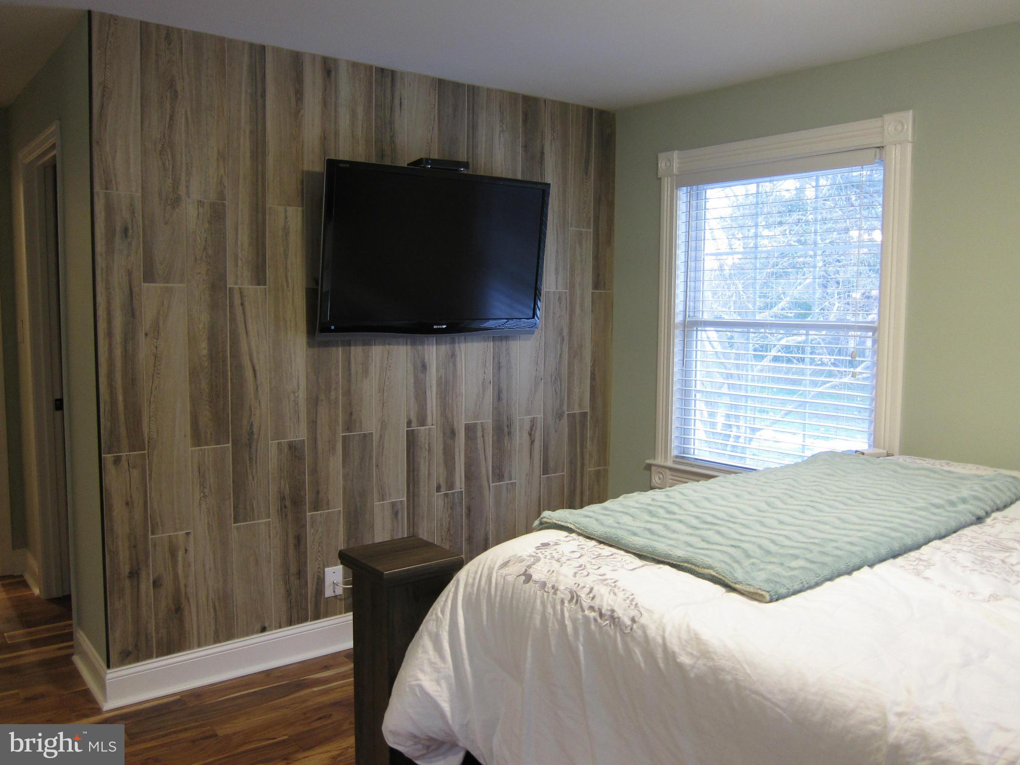 5723 Turner Road Broad Run, VA 20137 - Photo 13 of 29 Custom tile accent wall