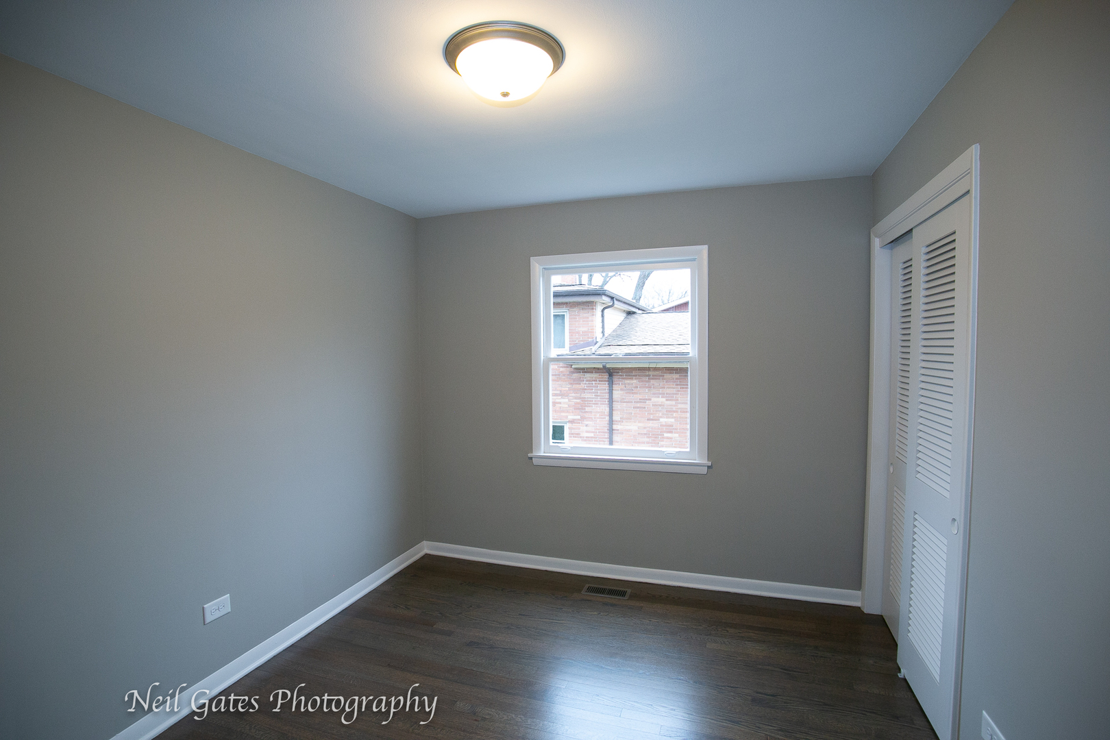 1459 West 187th Street Homewood, IL 60430 - Photo 14 of 32 an empty room with wooden floor and windows