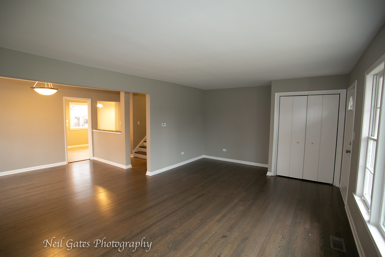 1459 West 187th Street Homewood, IL 60430 - Photo 3 of 32 a view of an empty room with wooden floor and a window