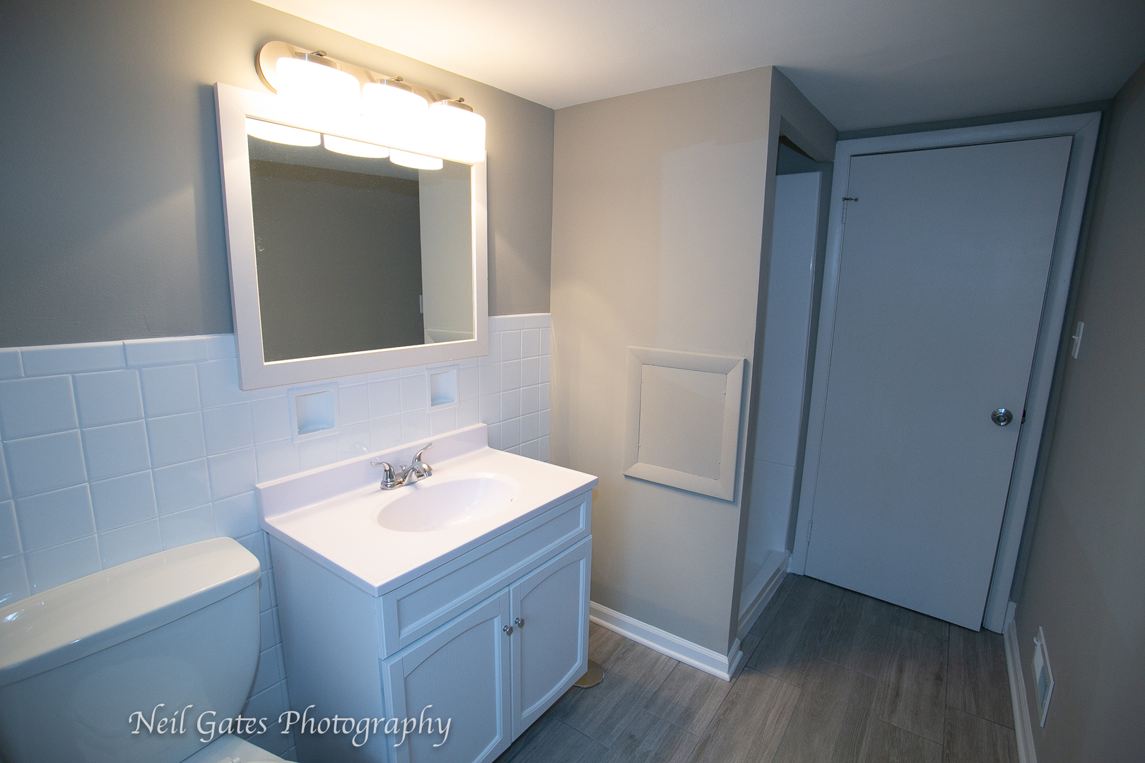 1459 West 187th Street Homewood, IL 60430 - Photo 21 of 32 a bathroom with a sink and a mirror