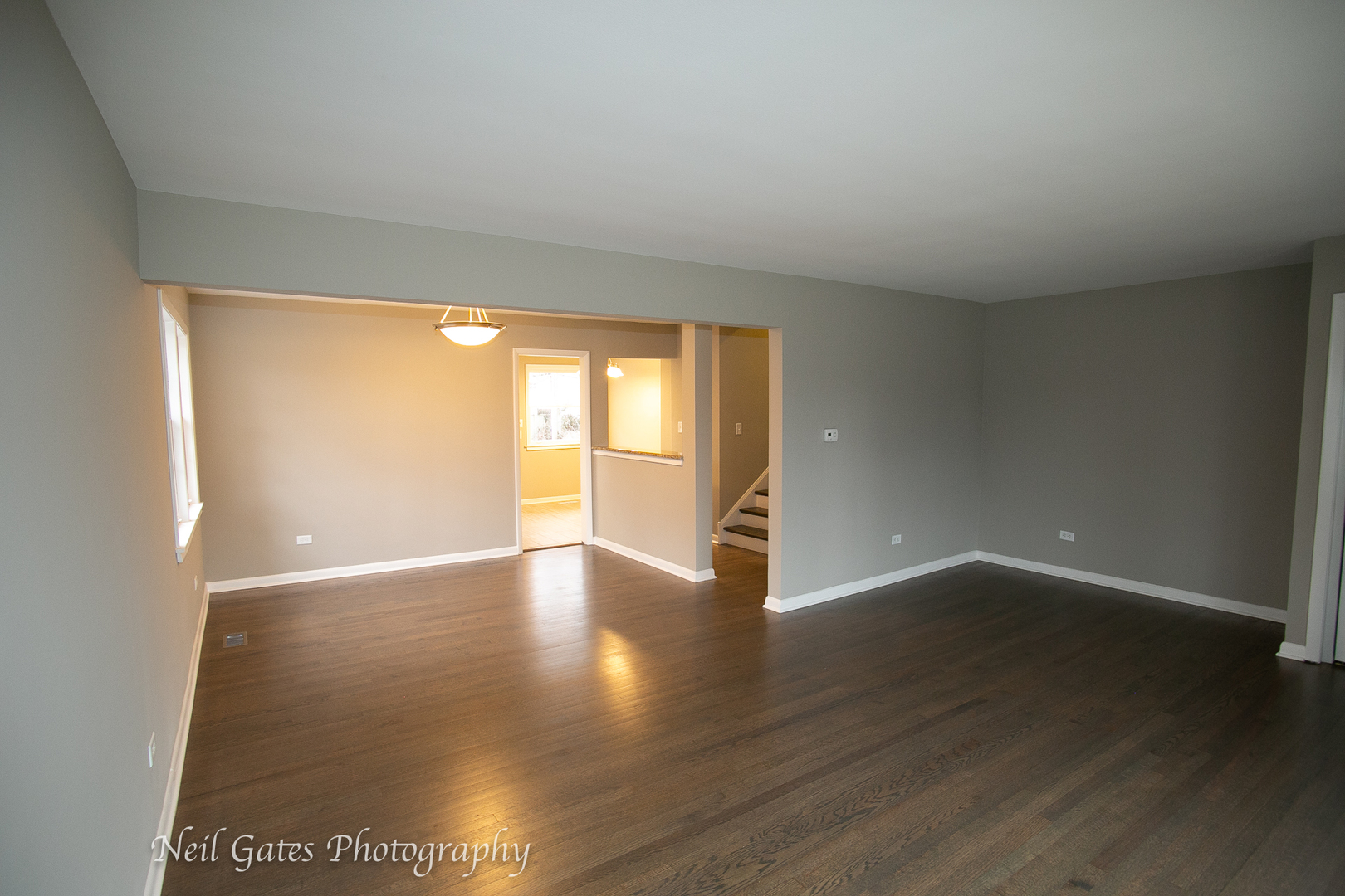 1459 West 187th Street Homewood, IL 60430 - Photo 4 of 32 a view of an empty room with wooden floor and a window