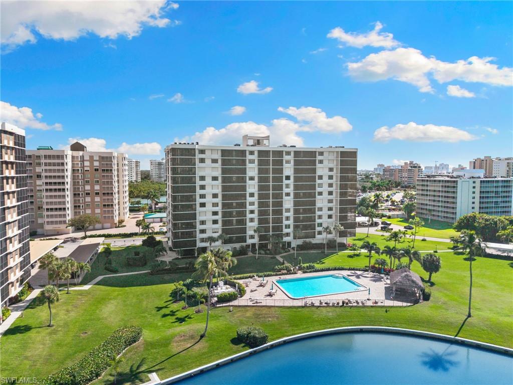 11 Bluebill Avenue, Unit 702 Naples, FL 34108 - Photo 32 of 35 a view of a city with tall buildings
