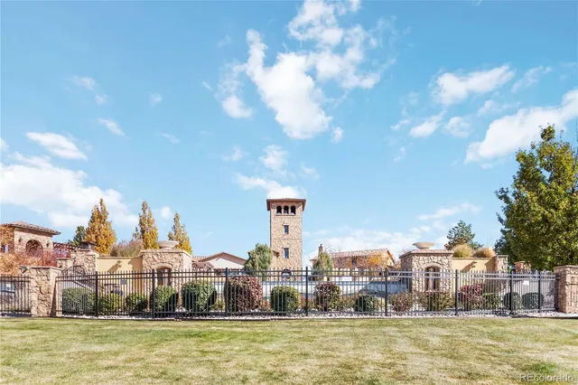 a view of a large body of water with a building in the background