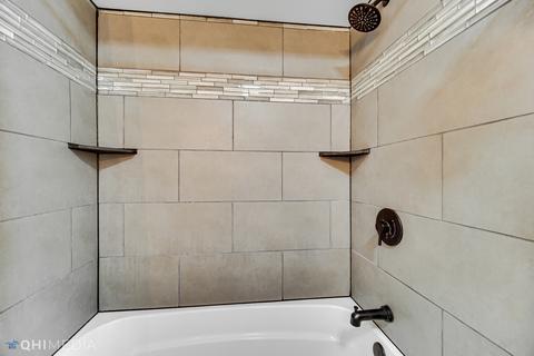 249 Rockhurst Road Bolingbrook, IL 60440 - Photo 14 of 18 a bathroom with a shower