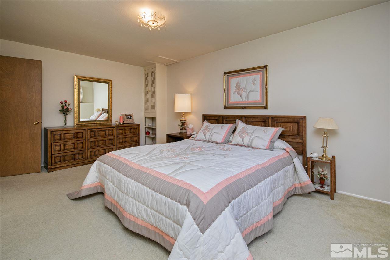 3360 Marthiam Avenue Reno, NV 89509 - Photo 12 of 39 a bedroom with a bed and dresser