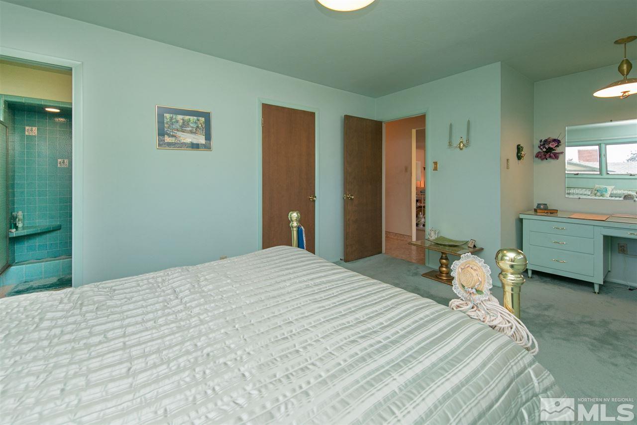 3360 Marthiam Avenue Reno, NV 89509 - Photo 16 of 39 a bedroom with a bed and a window