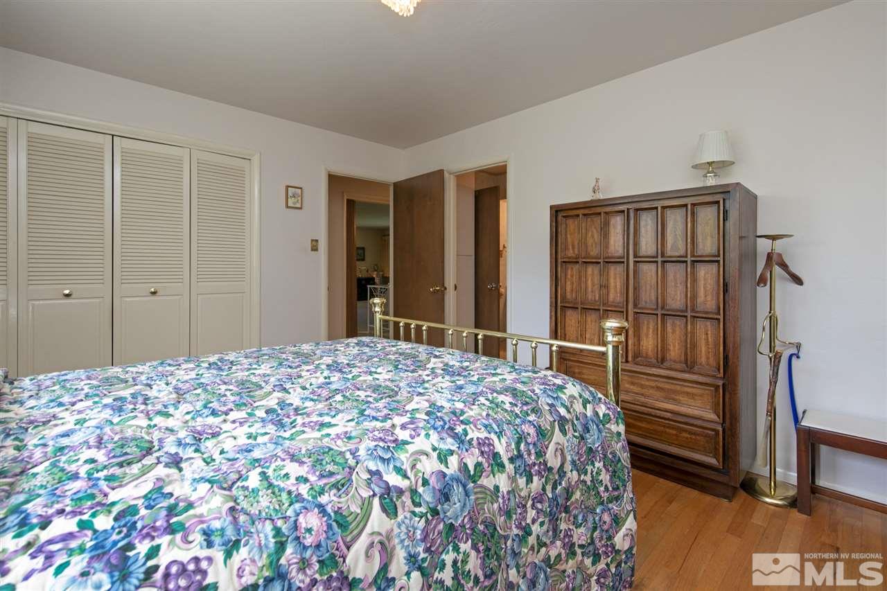 3360 Marthiam Avenue Reno, NV 89509 - Photo 18 of 39 a bedroom with a bed and a window
