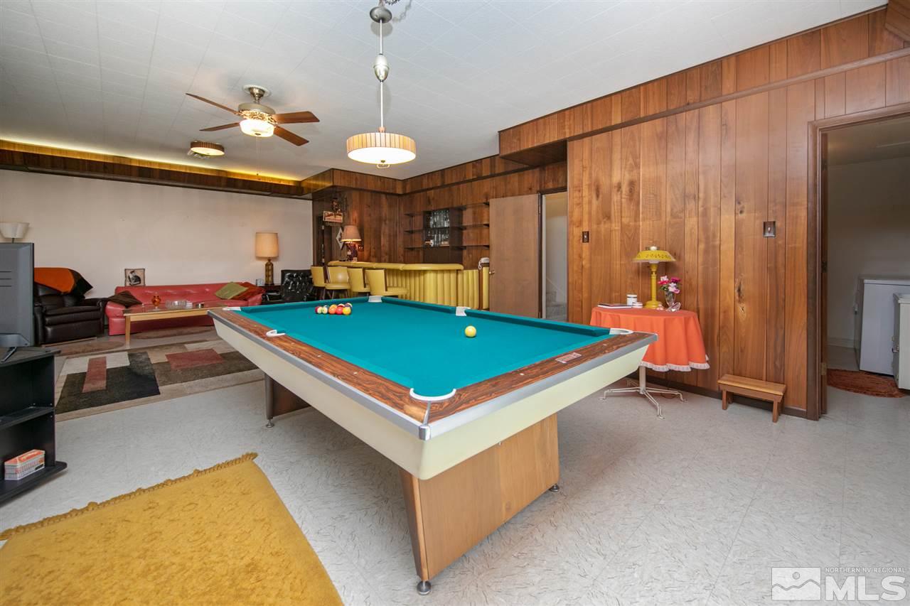 3360 Marthiam Avenue Reno, NV 89509 - Photo 22 of 39 a room with pool table and a chandelier