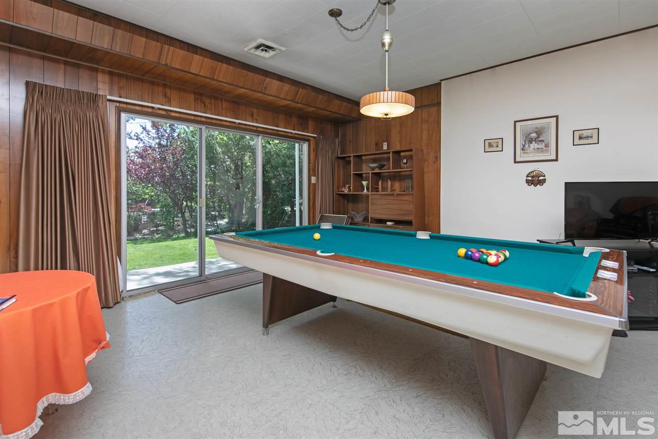 3360 Marthiam Avenue Reno, NV 89509 - Photo 24 of 39 a room with pool table and windows
