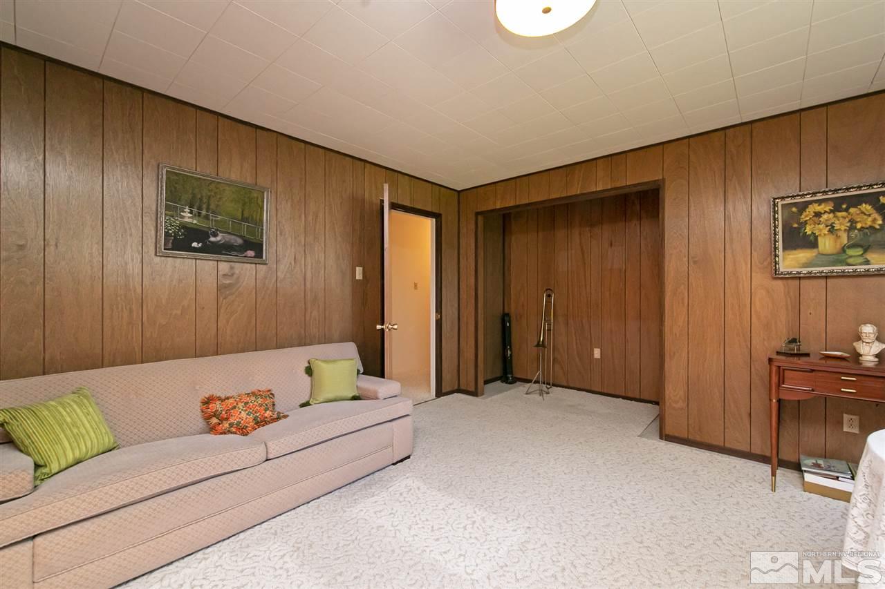 3360 Marthiam Avenue Reno, NV 89509 - Photo 26 of 39 a bedroom with a bed and furniture
