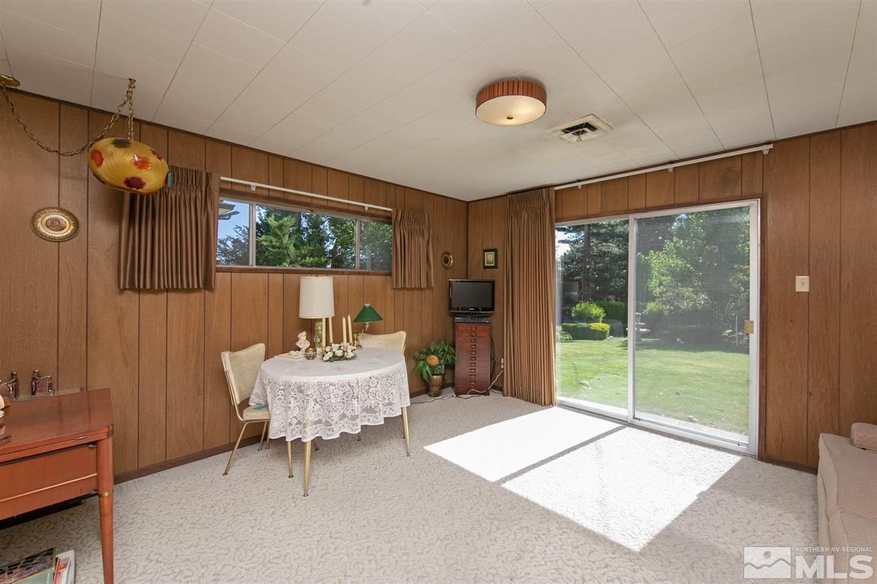 3360 Marthiam Avenue Reno, NV 89509 - Photo 27 of 39 a living room with furniture and a large window
