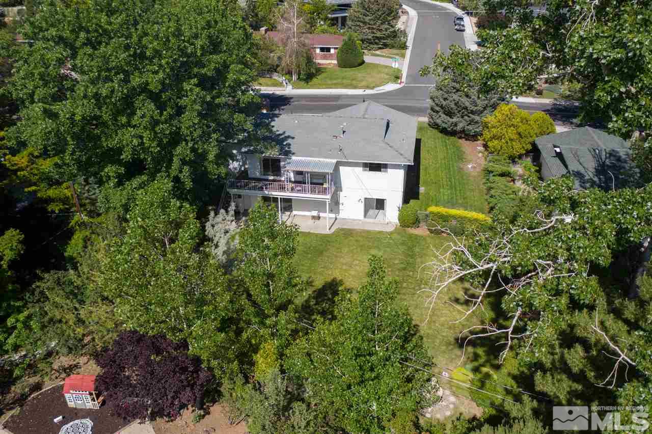 3360 Marthiam Avenue Reno, NV 89509 - Photo 36 of 39 an aerial view of residential house with outdoor space and trees all around