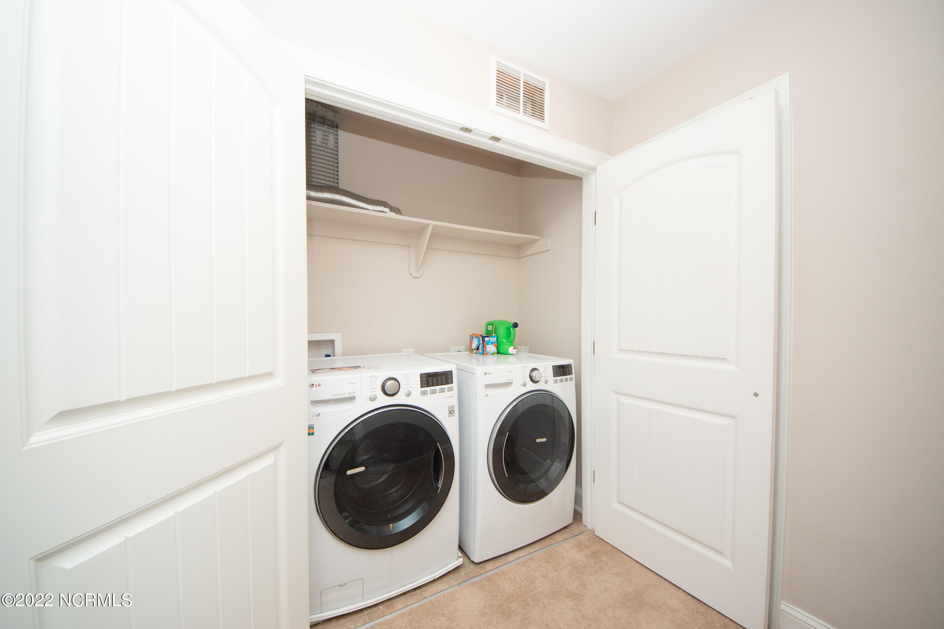 309 Catamaran Road Swansboro, NC 28584 - Photo 36 of 68 Upstairs laundry closet