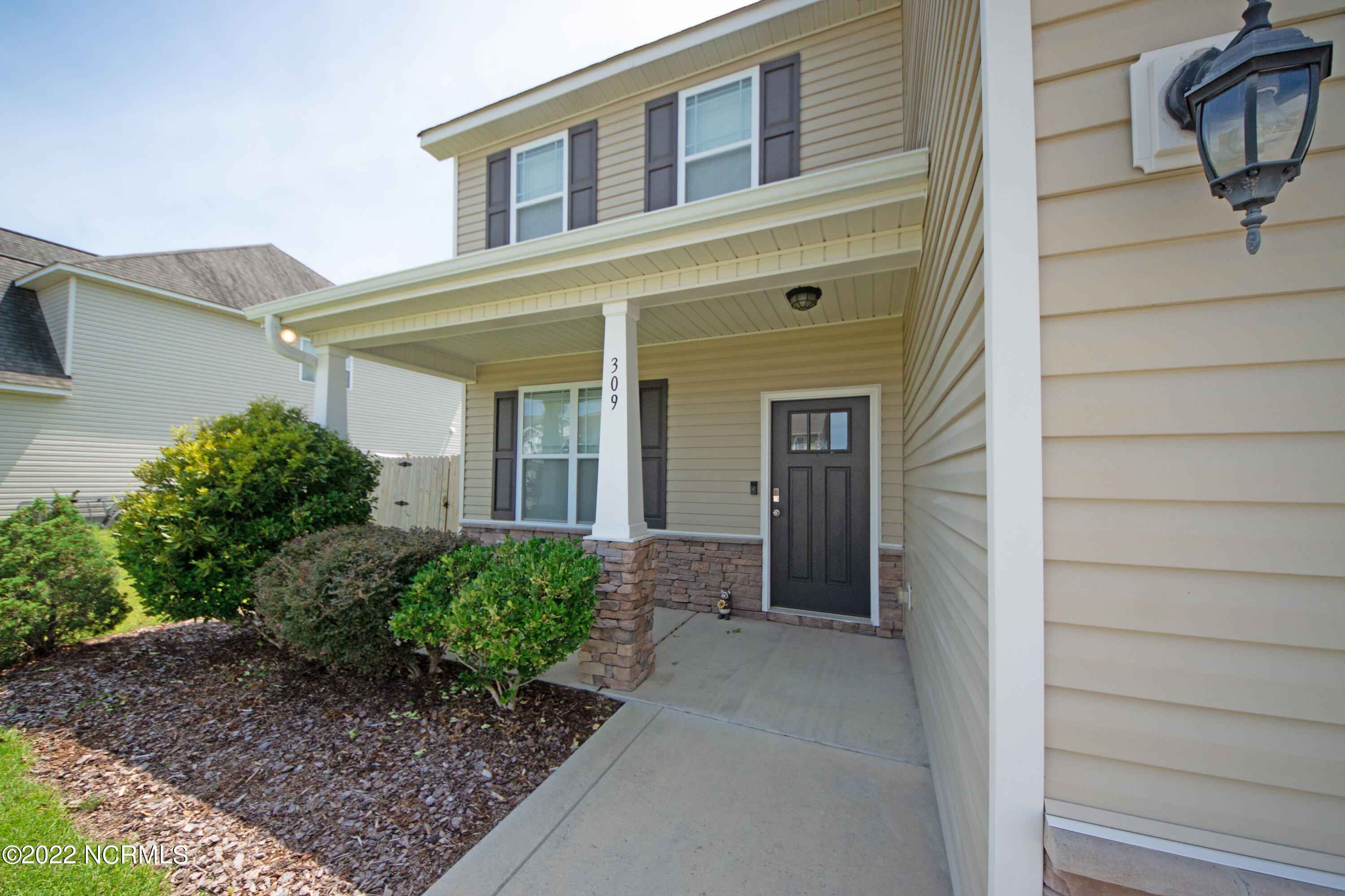 309 Catamaran Road Swansboro, NC 28584 - Photo 6 of 68 Covered front porch