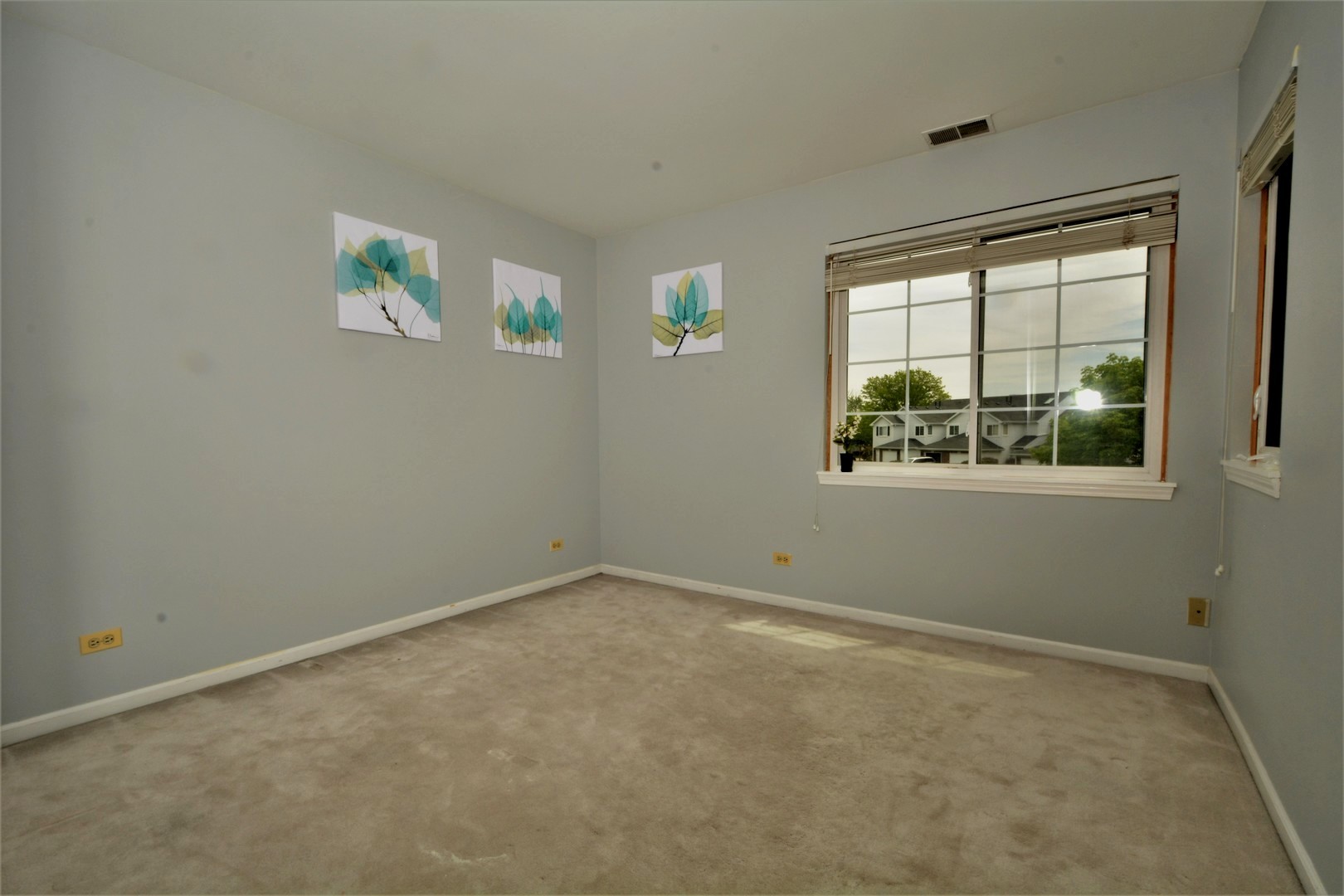 8187 Ripple Ridge Darien, IL 60561 - Photo 17 of 21 an empty room with windows