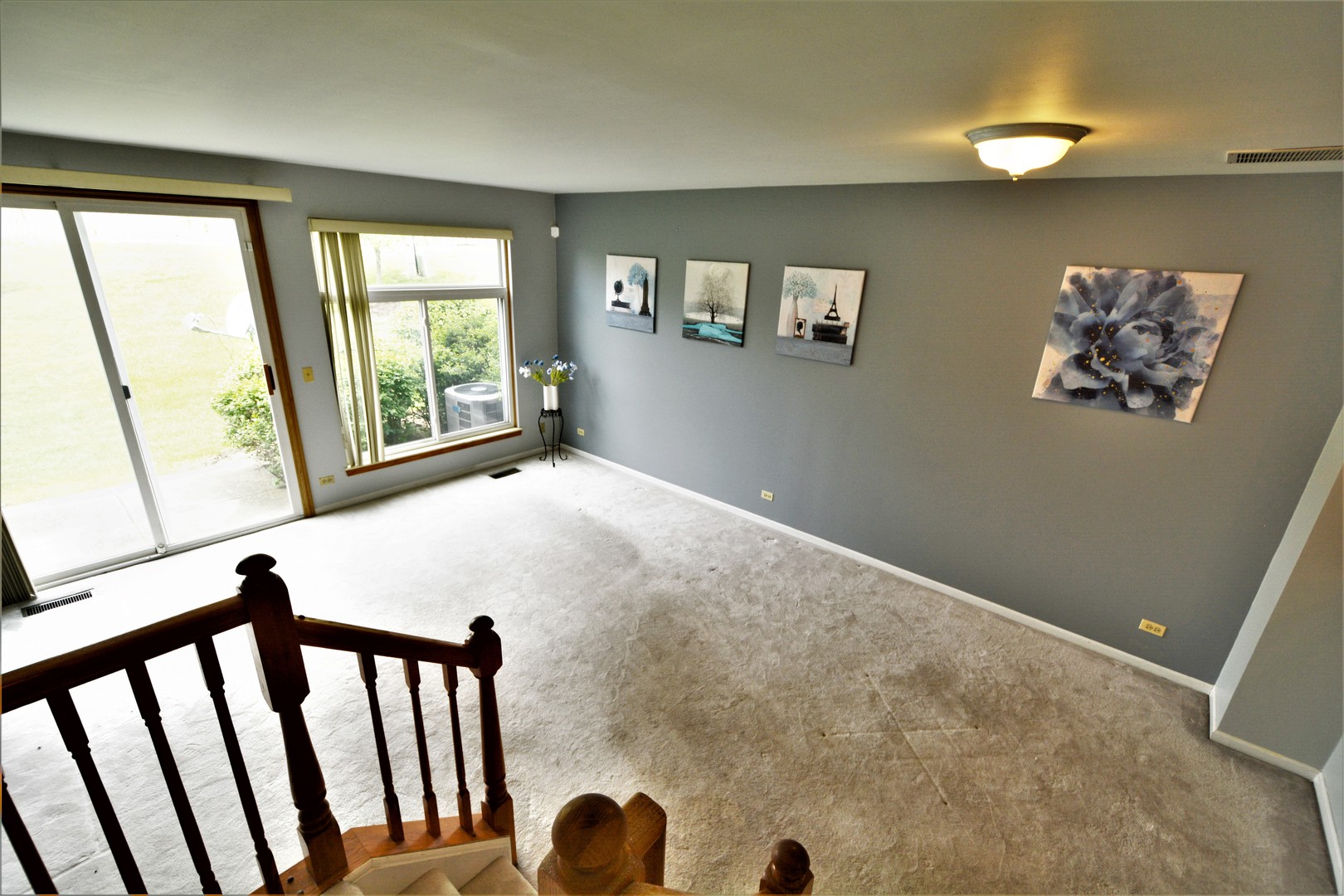 8187 Ripple Ridge Darien, IL 60561 - Photo 19 of 21 a view of livingroom with furniture and windows