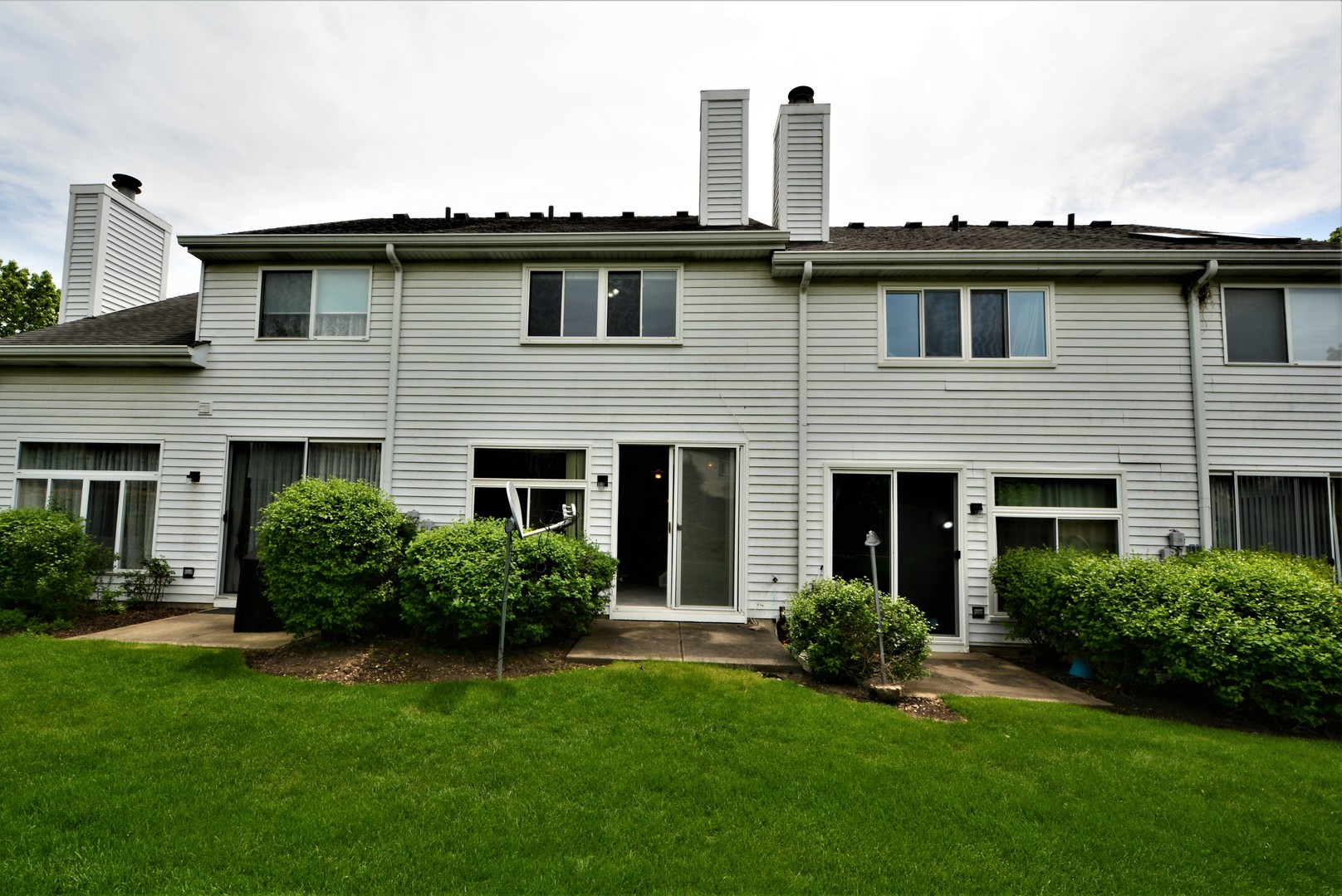 8187 Ripple Ridge Darien, IL 60561 - Photo 21 of 21 a front view of a house with a garden