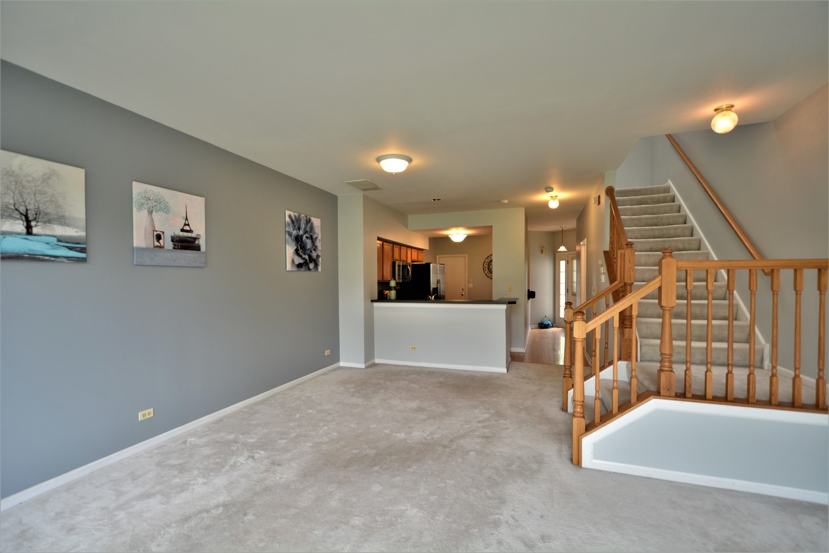 8187 Ripple Ridge Darien, IL 60561 - Photo 8 of 21 a view of an empty room with stairs