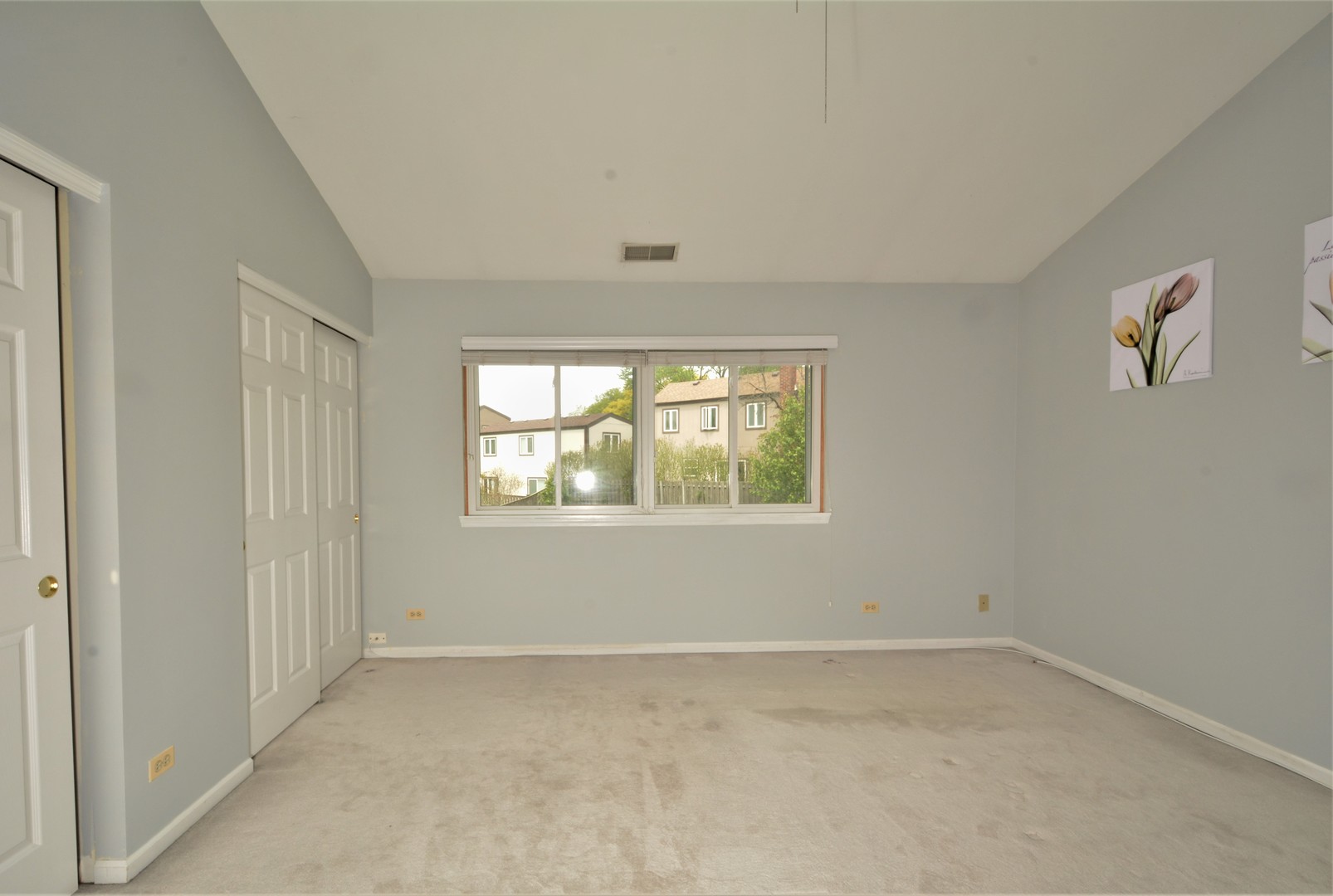 8187 Ripple Ridge Darien, IL 60561 - Photo 9 of 21 an empty room with a window