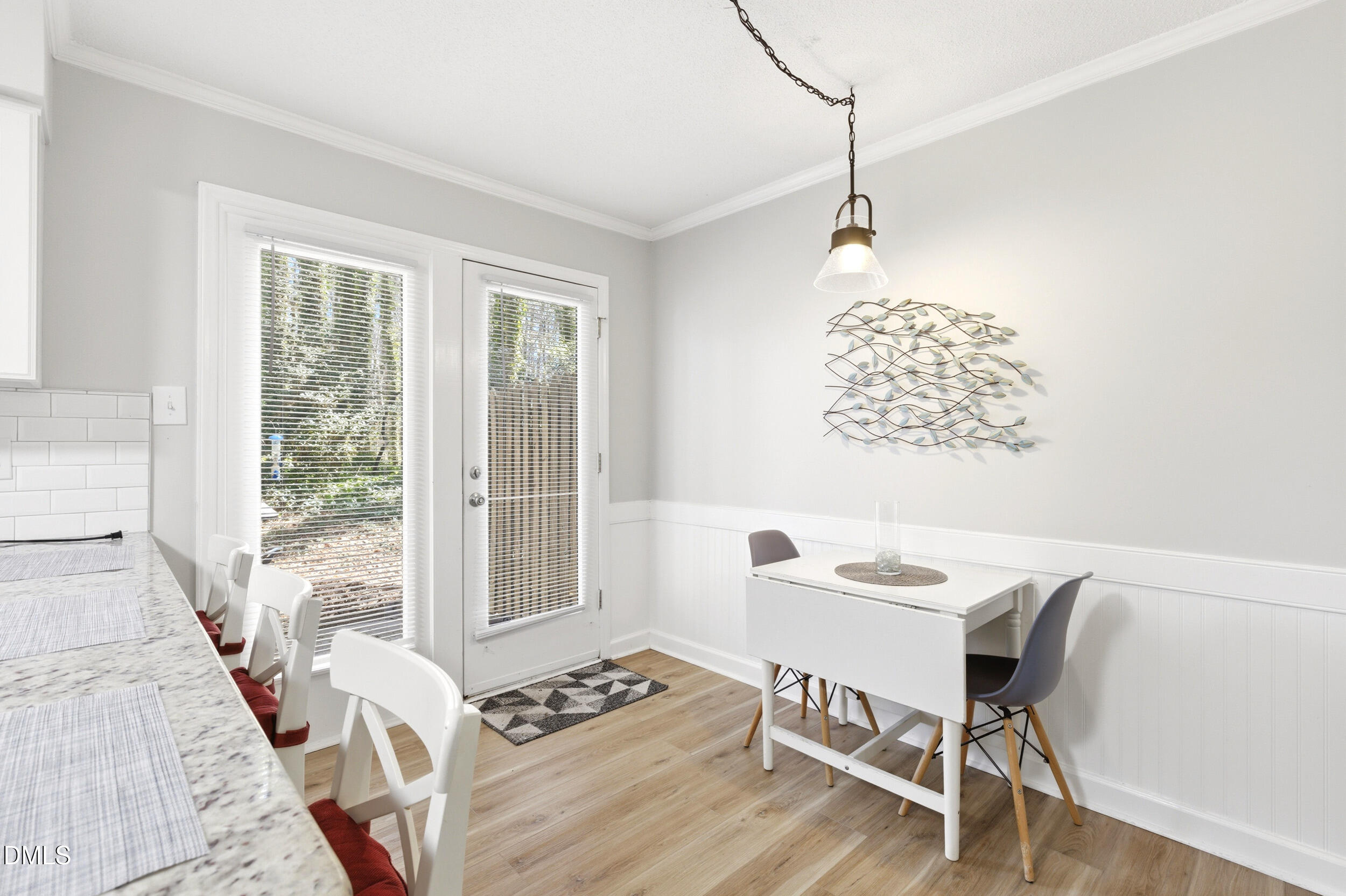 725 Charleston Road Raleigh, NC 27606 - Photo 10 of 27 a dining room with furniture and window