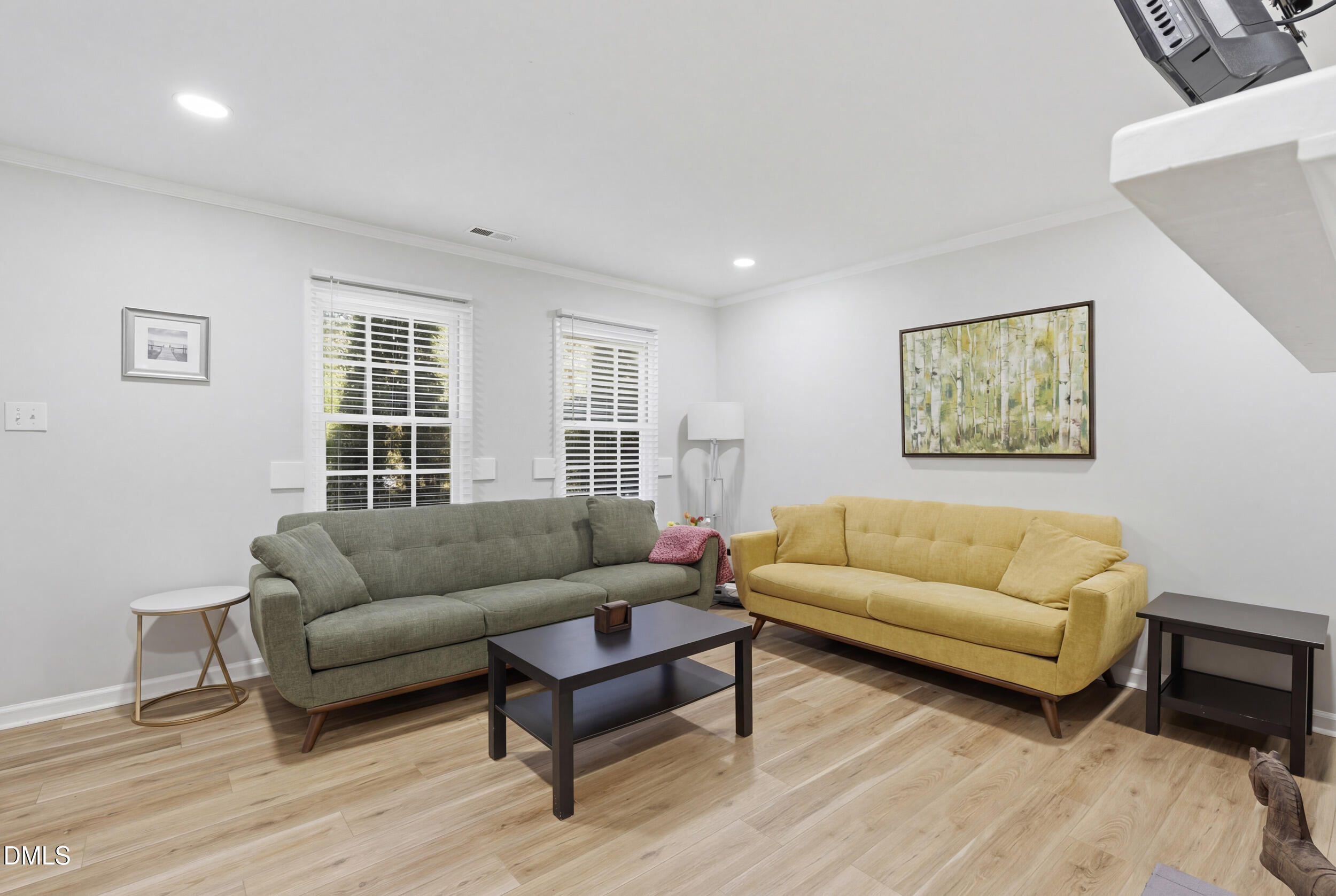 725 Charleston Road Raleigh, NC 27606 - Photo 4 of 27 a living room with furniture and a window