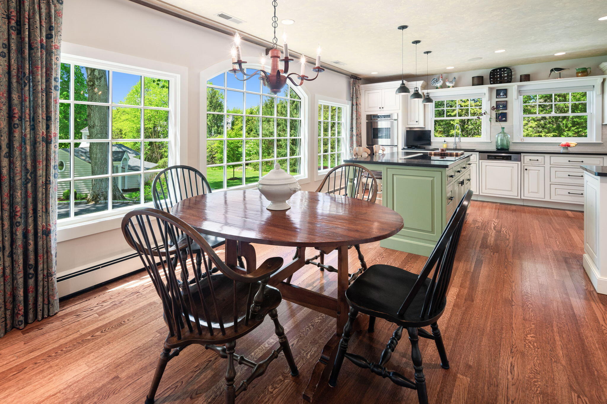 1466 Ponus Ridge Road New Canaan, CT 06840 - Photo 14 of 81 a view of a dining room with furniture window and outside view
