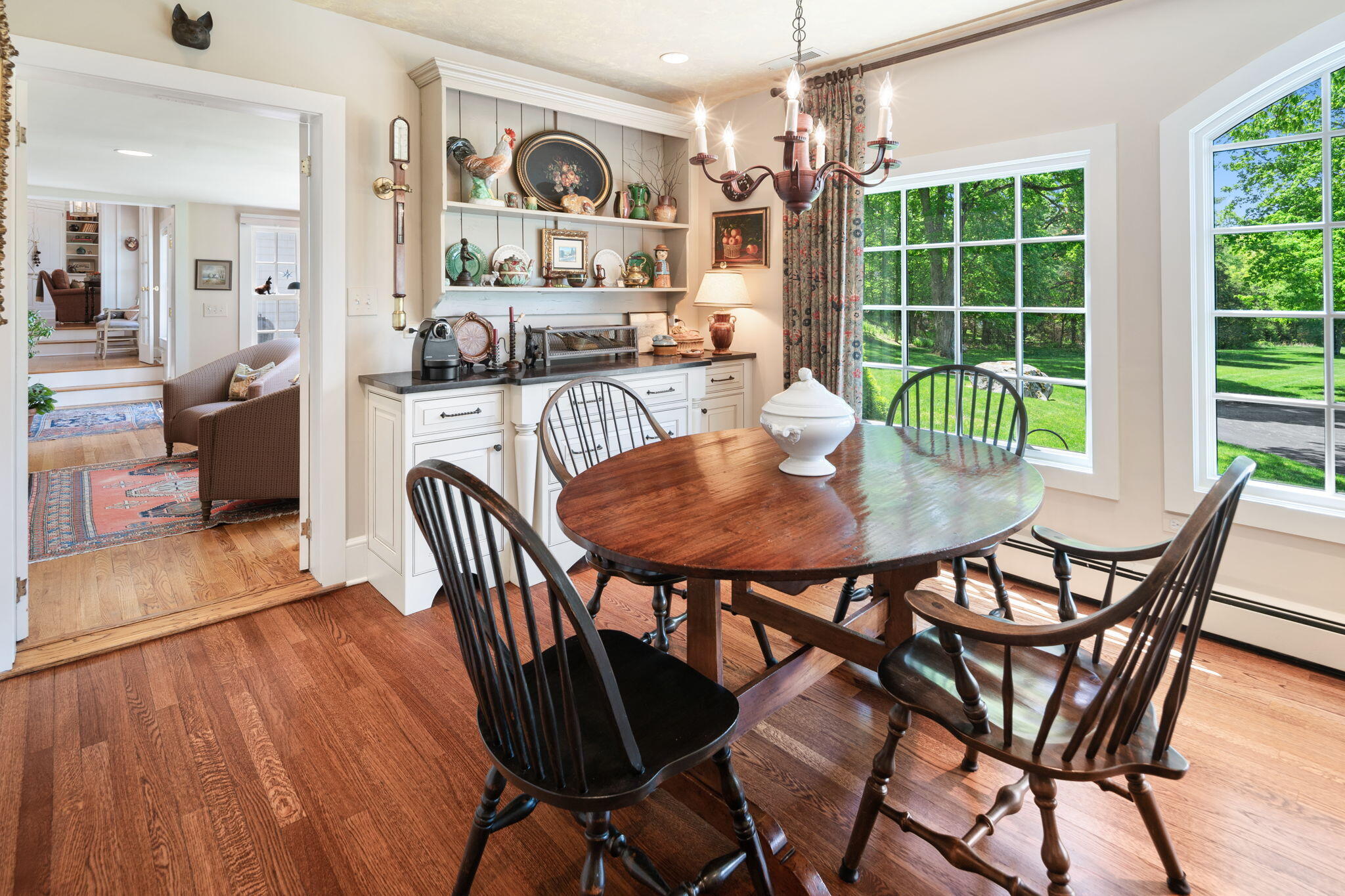 1466 Ponus Ridge Road New Canaan, CT 06840 - Photo 15 of 81 a dining room with furniture and wooden floor