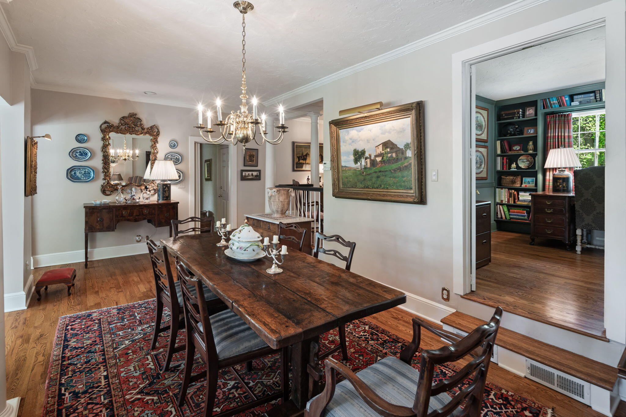 1466 Ponus Ridge Road New Canaan, CT 06840 - Photo 23 of 81 a view of a dining room with furniture wooden floor and chandelier