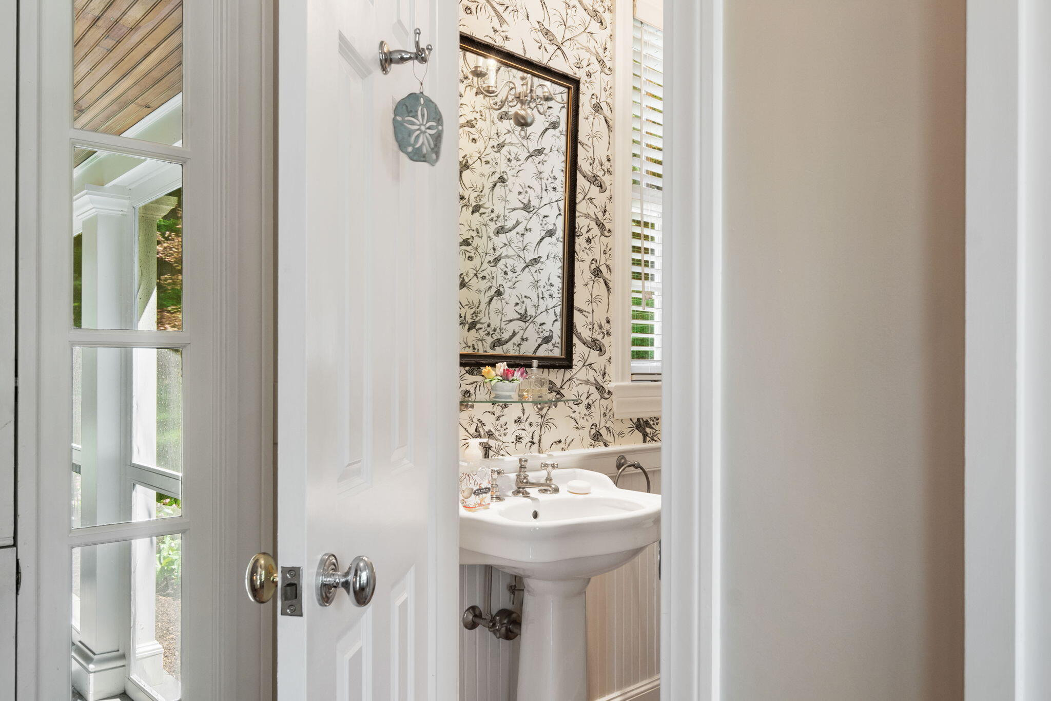 1466 Ponus Ridge Road New Canaan, CT 06840 - Photo 26 of 81 a bathroom with a sink a mirror and shower