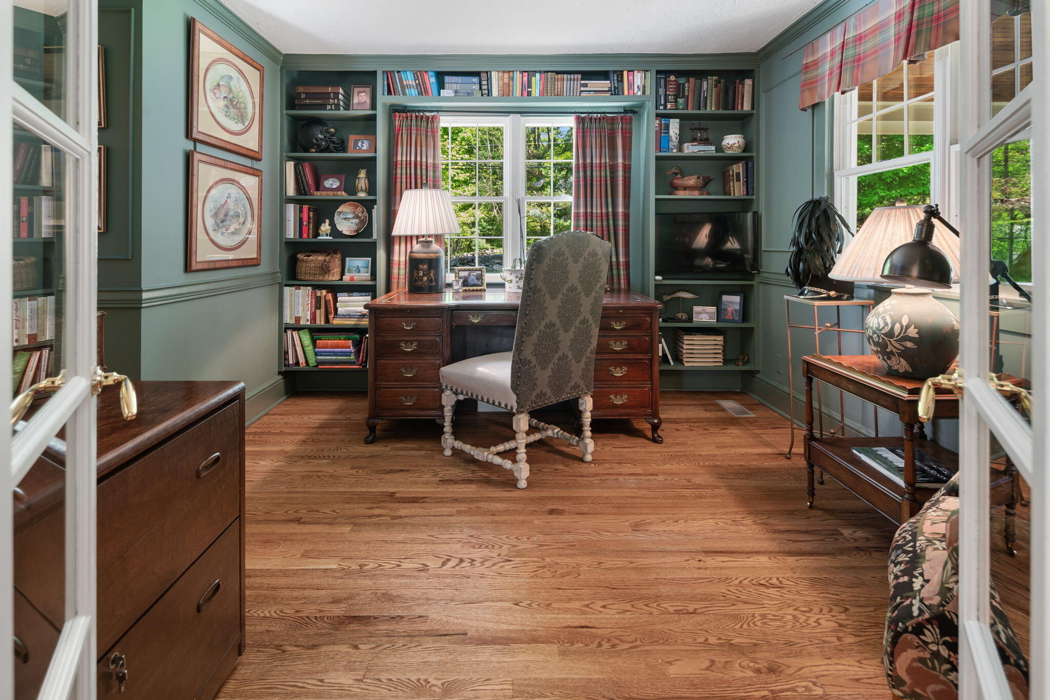1466 Ponus Ridge Road New Canaan, CT 06840 - Photo 33 of 81 a view of a workspace with furniture and a window