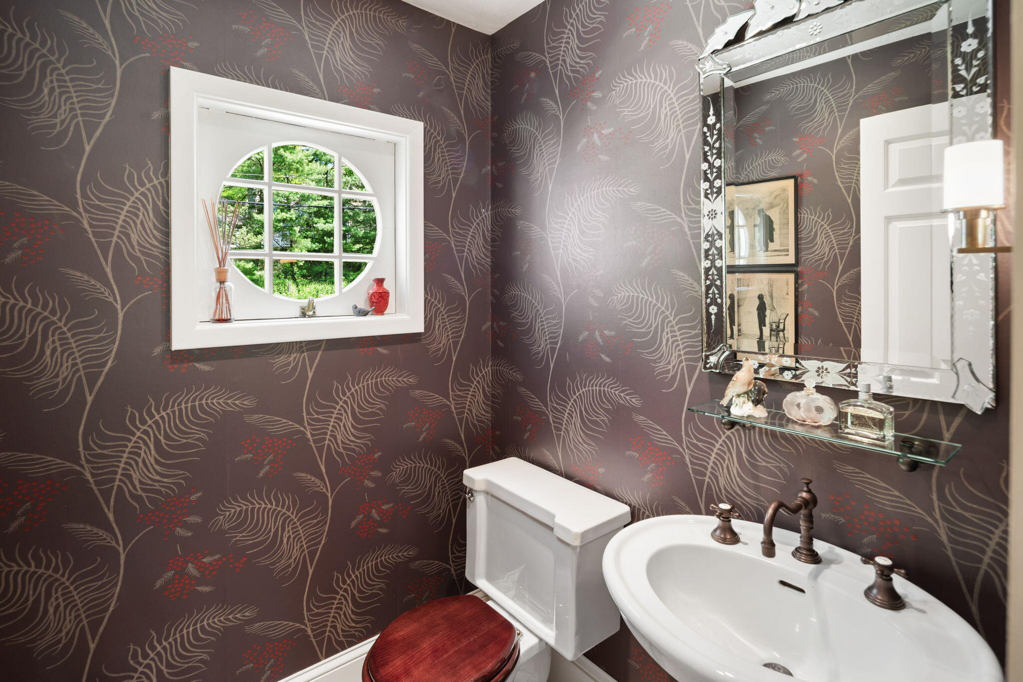 1466 Ponus Ridge Road New Canaan, CT 06840 - Photo 35 of 81 a bathroom with a sink and a mirror