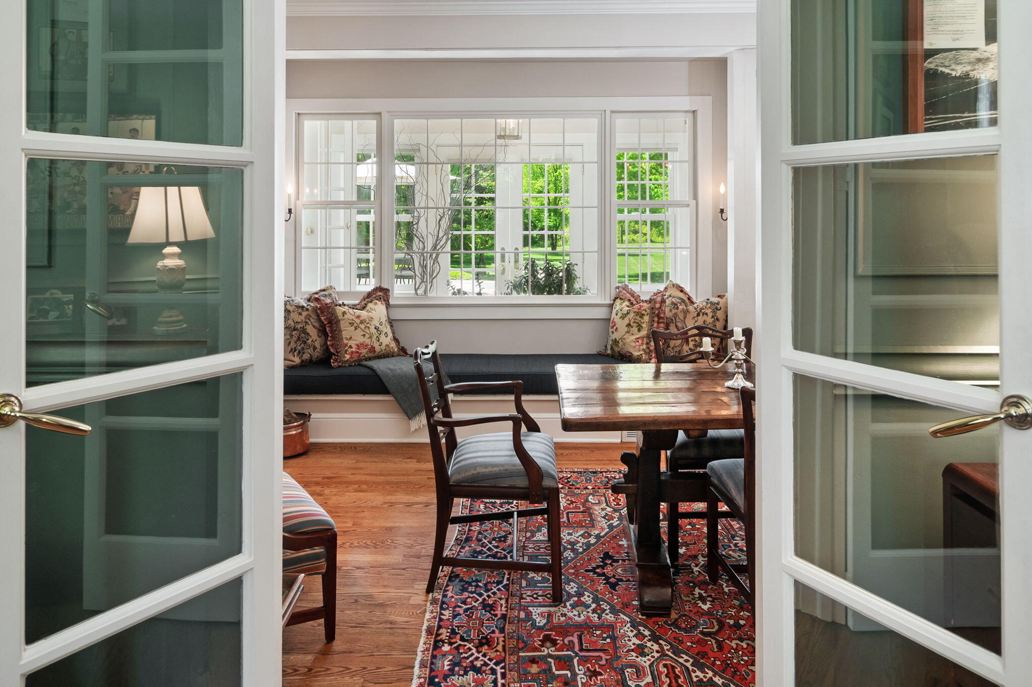 1466 Ponus Ridge Road New Canaan, CT 06840 - Photo 36 of 81 a dining room with furniture and window